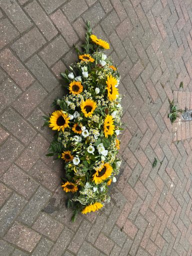 Sunflower coffin spray